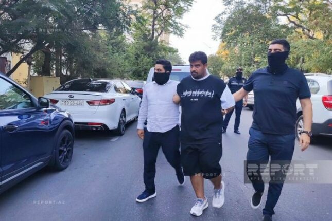 Məhkəmə Şəhidlər xiyabanında qeyri-etik videolar çəkən əcnəbiləri üç ay müddətinə həbs edib -VİDEO