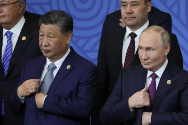 Mikrofonu bağlamağı unutdu, hamı Putinin nə danışdığını eşitdi